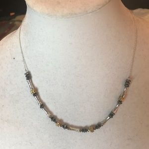 Women’s black and silver beaded choker.